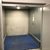 Goods lift between level in supermarket - open