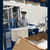 Translyft work platform for manufacturer of food packaging - man sorting on lift
